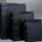 Black laminated wine gift bag branded with company logo in Nairobi